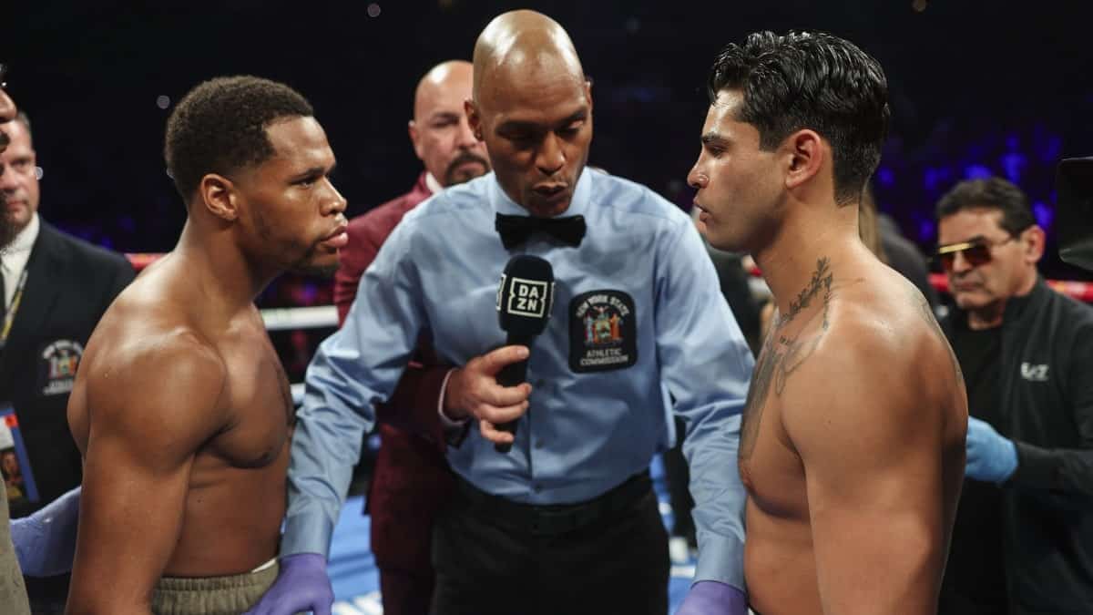 Devin Haney and Ryan Garcia with ref